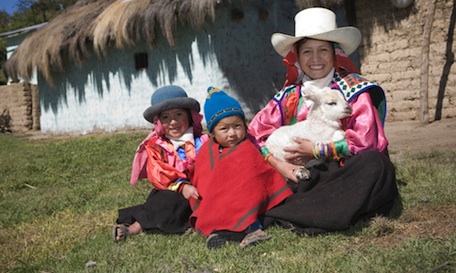 Peru Martina Barrios (26) with her children outside their home