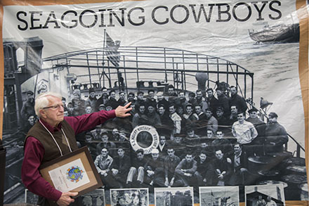 A seagoing cowboy points to himself aboard a ship that delivered animals to families in war-torn Europe in the 1940s. A seagoing cowboy points to himself aboard a ship that delivered animals to families in war-torn Europe in the 1940s.