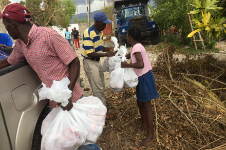 Heifer staff distributed 1,500 food kits yesterday. Heifer staff distribute food kits.