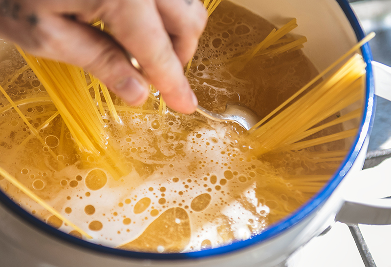 Pasta boiling in water.