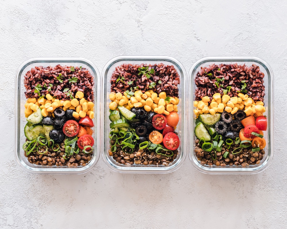 Three containers of pre-prepared meals.