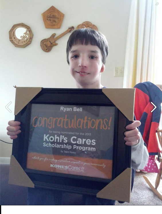 Ryan Bell shows off the certificate he received indicating he was nominated for the Kohl's Cares Scholarship Program. Ryan's teachers nominated him for his work fundraising for Heifer International among other volunteer endeavors.